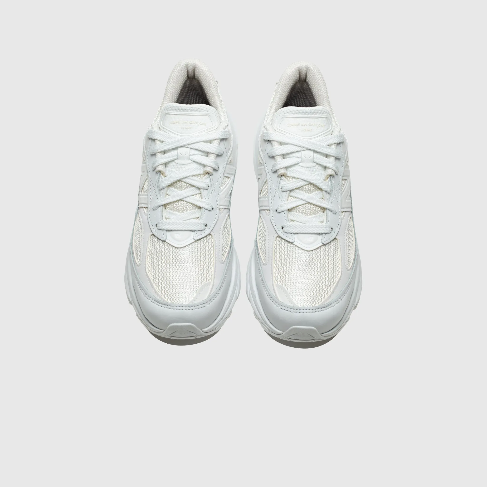 U990CD6 X CDG HOMME Low Profile Design Gold Tone
