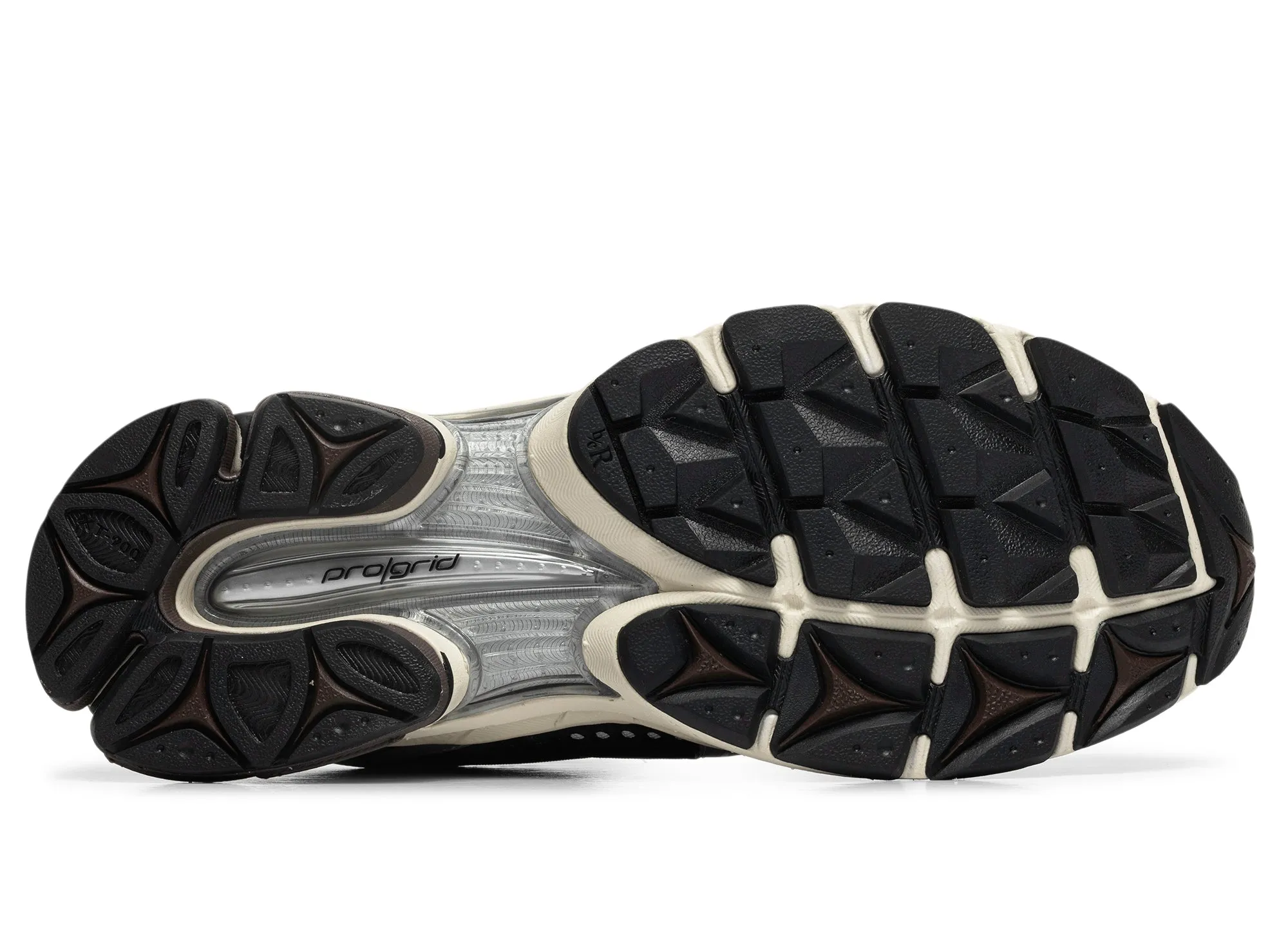 Saucony Progrid Triumph 4 Silver running in a sidewalk area shoes