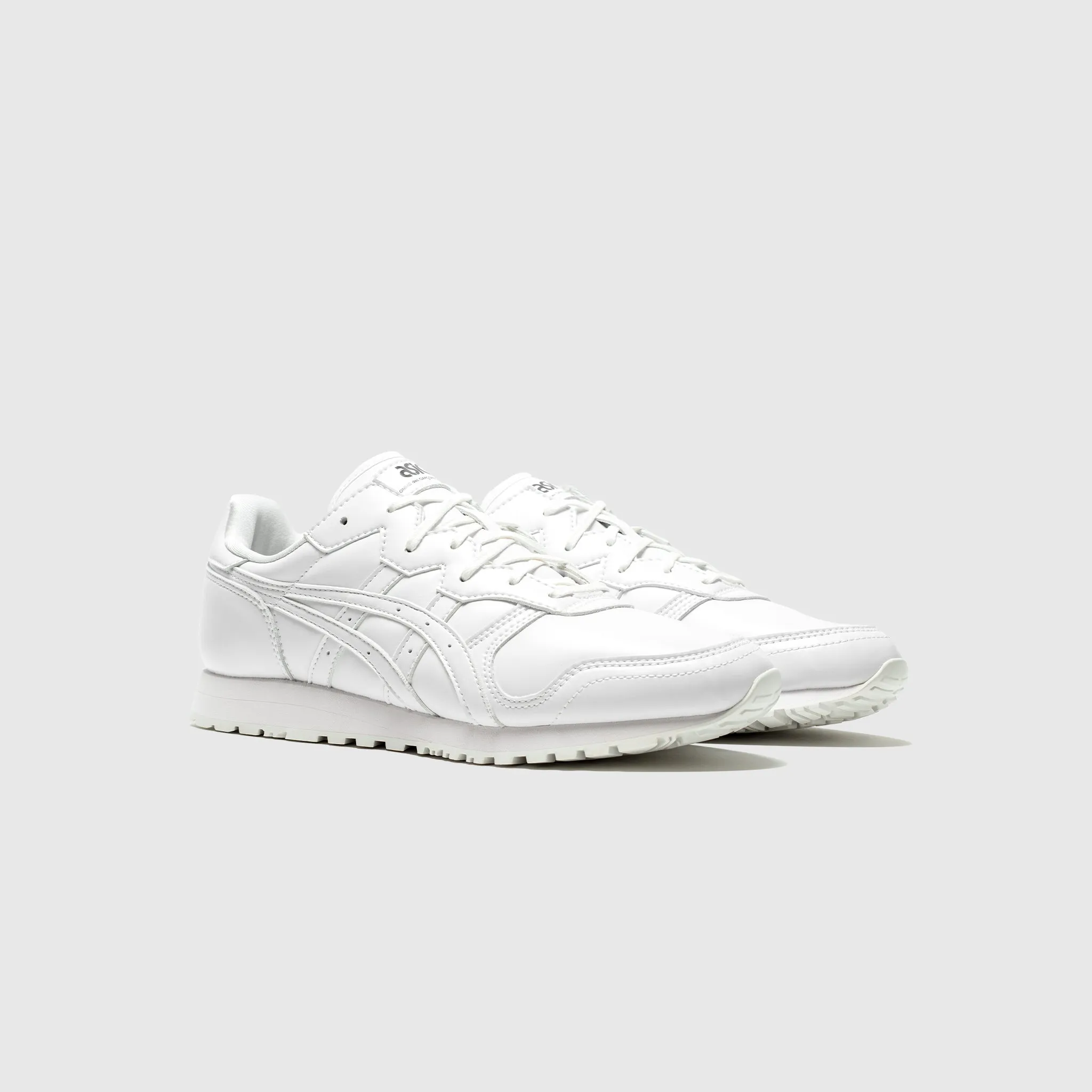 Multidirectional Grip running in old tracks shoes ASICS OC RUNNER (WHITE)